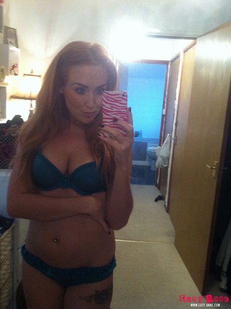 Gorgeous czech blonde Lucy Anne gets naked in a sexy manner in a bedroom