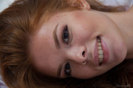 Adorable teen Natalie removes her lingerie to pose nude with self-assuredness