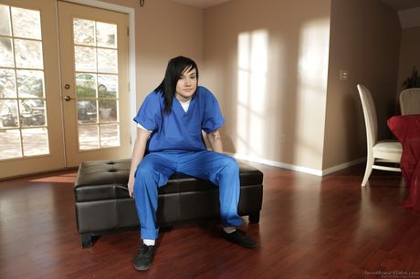 Fingering her hairy pussy, she flaunts her big juggs and round ass