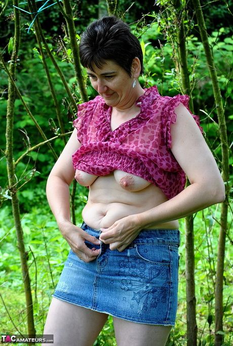 Mature german brunette Hot Milf strips to her heels in the woods