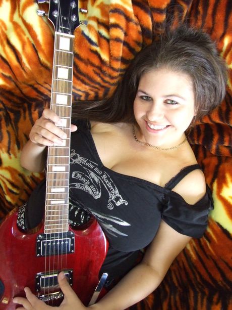 Mature british dark-haired Denise Davies unveils her amazing tits and poses in a solo