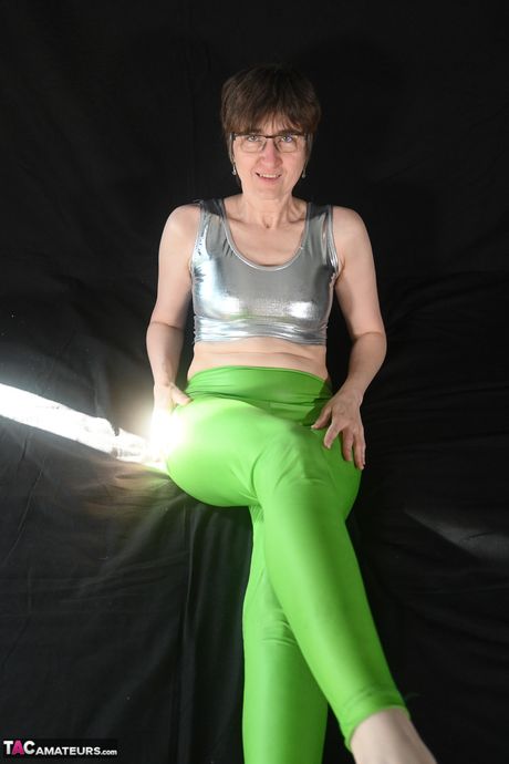 Hot german mature lady in glasses strips to show her hairy pussy