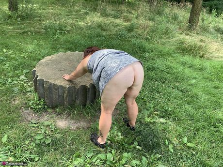 Aged american dark-haired Sexy Ne displays her large boobs and ass before masturbating