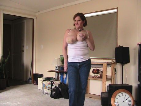 Mature Misha Milf strips to her boots and toys her horny pussy