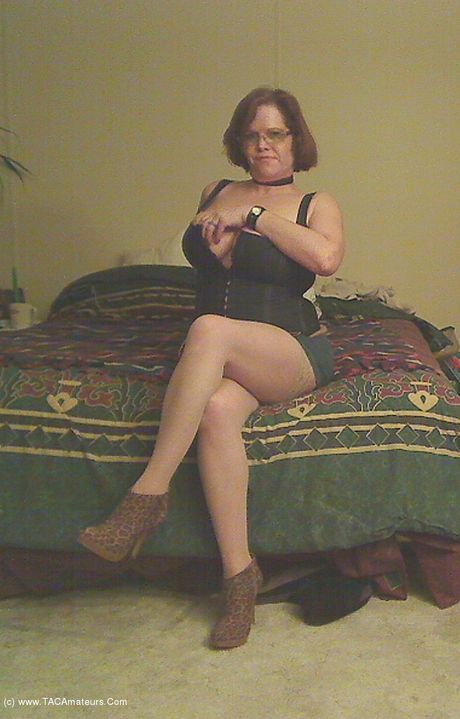 Stunning canadian Mom Misha Milf strips to her boots and toys her horny pussy