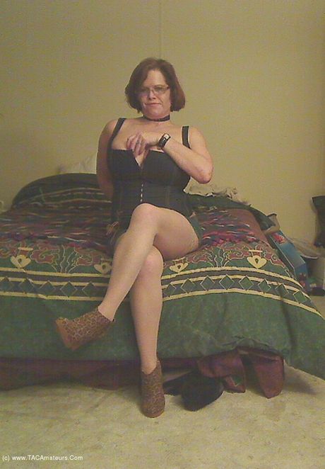 Stunning canadian Mom Misha Milf strips to her boots and toys her horny pussy