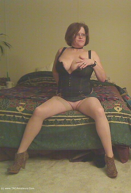 Stunning canadian Mom Misha Milf strips to her boots and toys her horny pussy