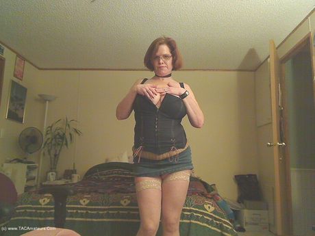 Stunning canadian Mom Misha Milf strips to her boots and toys her horny pussy