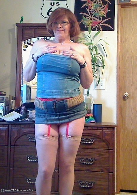 Aged canadian lady Misha Milf strips to her stockings before a finger fuck