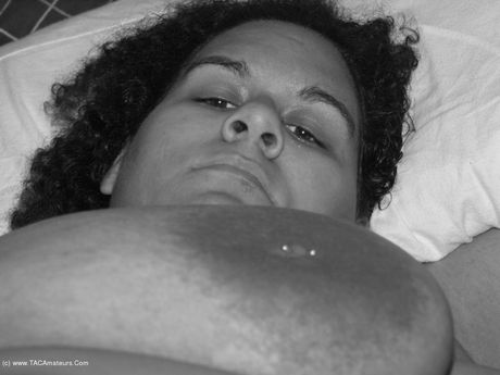 Curvy Baby Girl displays her big melons and rubs wet twat