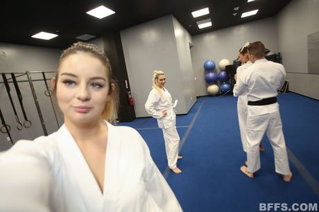 Three sexy girls share a dick during a foursome at a party