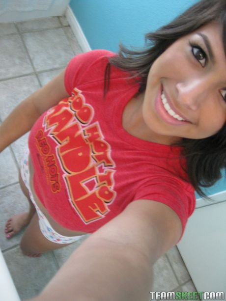 Latina stunner Layla Rose plays with her pussy after showing her amazing juggs