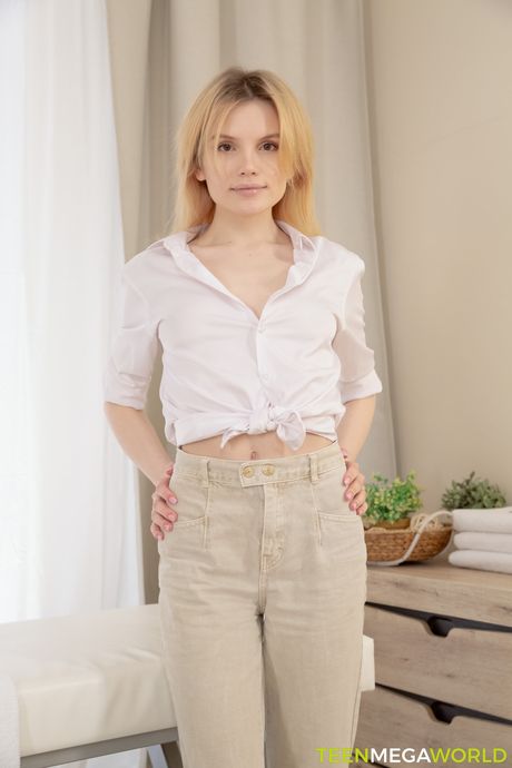 Blond russian teen Milka Way gets a massage before sex with a masseur