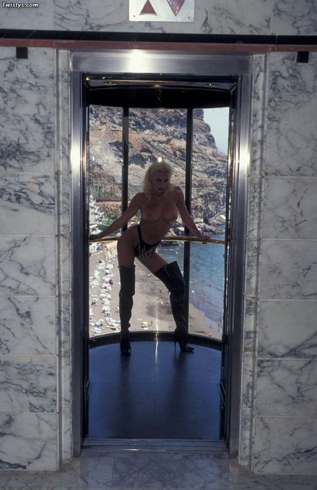 Blonde lesbian Zdenka Podkapova shows her tits and ass in a hot solo