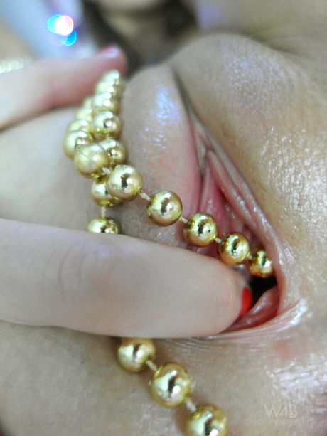 Lovely russian teen Melena A removes her red dress and presents her hot body