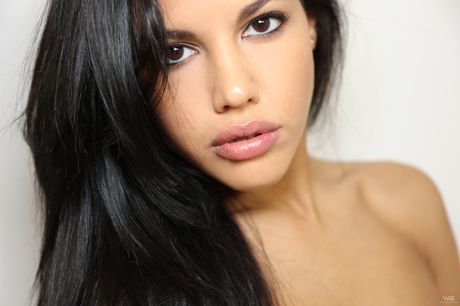 Brunette cutie Amateur shows her petite tiny tits and poses in a solo