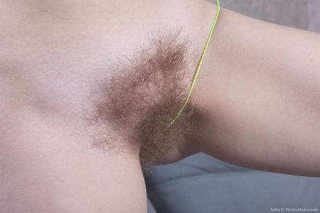 Nerdy russian teen Abby B strips and toys her hairy pussy in a solo