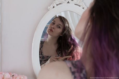 Natural titted teen Ksenia Yankovskaya flaunts her hairy pussy on the bed