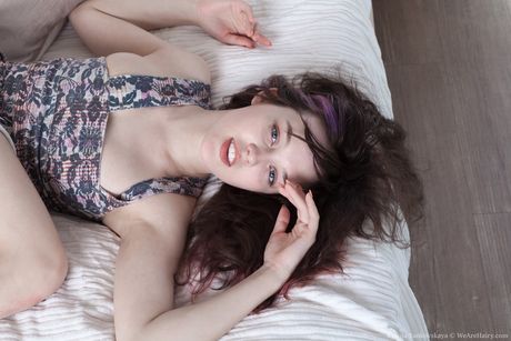 Natural titted teen Ksenia Yankovskaya flaunts her hairy pussy on the bed