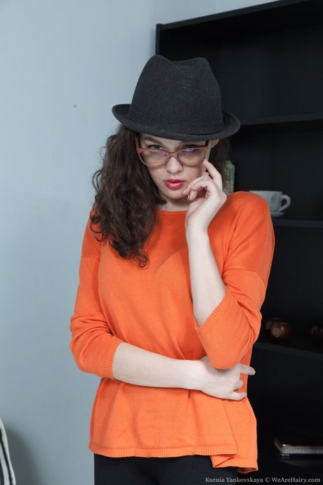 Glamorous russian cutie Ksenia Yankovskaya strips and flaunts her hairy pussy