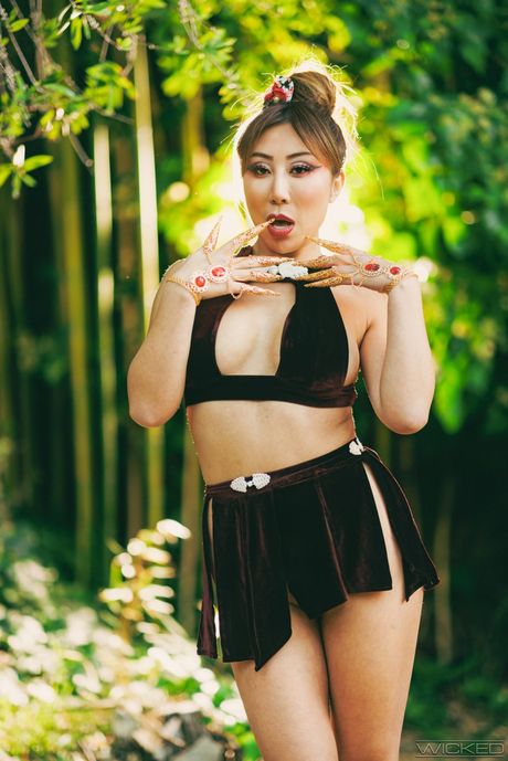 Asian girl Nicole Doshi sports a creampie after a fuck in a hallway